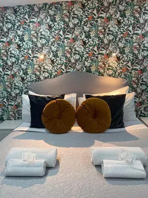 Letto o letti in una camera di Domus Leone