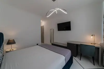 Letto o letti in una camera di Apart Hotel Suite Italy Naples Chiaia Mergellina