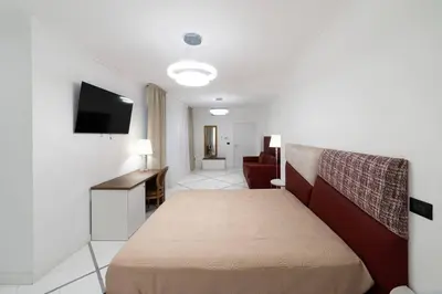 Letto o letti in una camera di Apart Hotel Suite Italy Naples Chiaia Mergellina