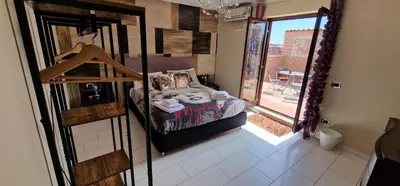 Letto o letti in una camera di Fashion House Napoli