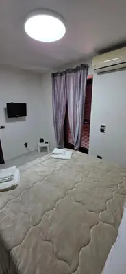 Letto o letti in una camera di Fashion House Napoli