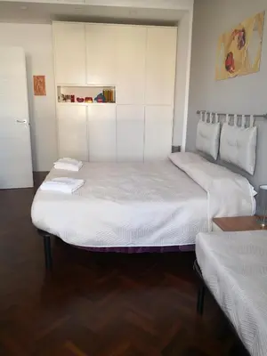 Letto o letti in una camera di HEart Napoli