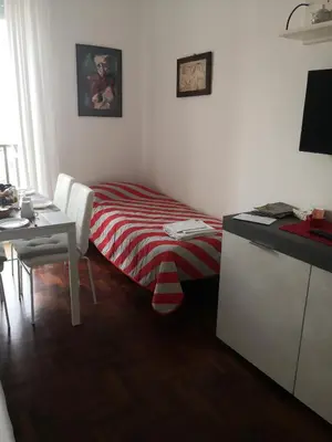 Letto o letti in una camera di HEart Napoli