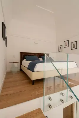 Letto o letti in una camera di A.RI.EL luxury apartment