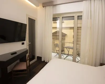 Letto o letti in una camera di Domus Altana