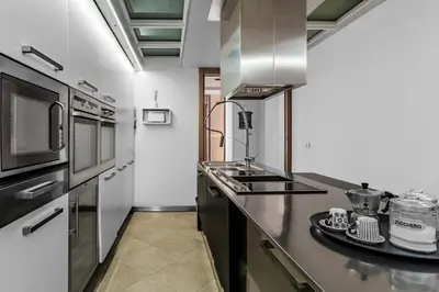 Cucina o angolo cottura di La bella vita luxury apartament and travel solution