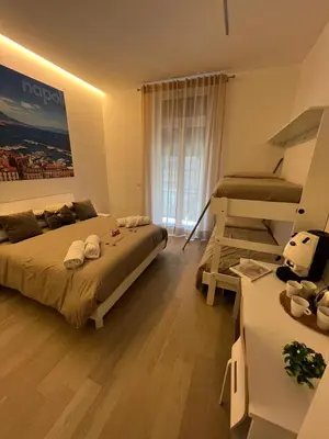 Letto o letti in una camera di K-Home