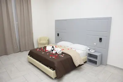 Letto o letti in una camera di Albergo Casablanca