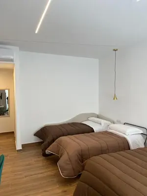 Letto o letti in una camera di TOLEDO3