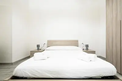 Letto o letti in una camera di Vico Mastellone 16