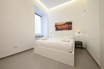 Letto o letti in una camera di Via Morghen 63