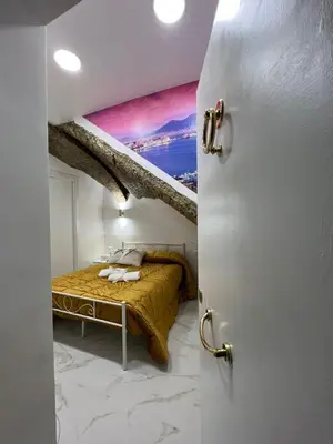 Letto o letti in una camera di Casa Nunù