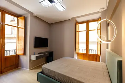 Letto o letti in una camera di Seven Winds Suite