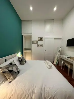 Letto o letti in una camera di La stanza di Eleonora