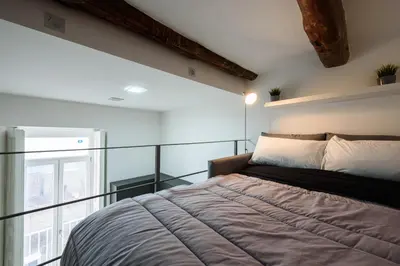 Letto o letti in una camera di AF Appart'Hotel Napoli