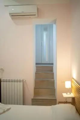 Letto o letti in una camera di La Casa di Lucia By Dimorra
