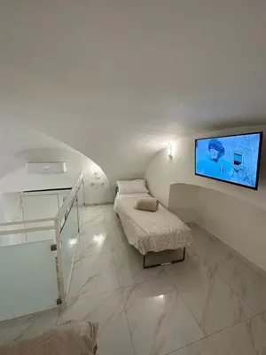 Letto o letti in una camera di Dimora nei Quartieri Spagnoli