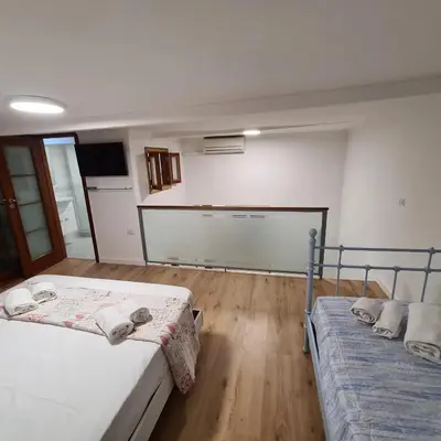 Letto o letti in una camera di Casa Mia al Plebiscito