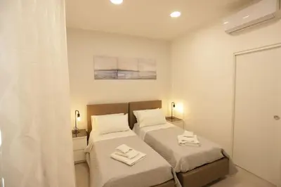 Letto o letti in una camera di Santa Chiara Luxury House