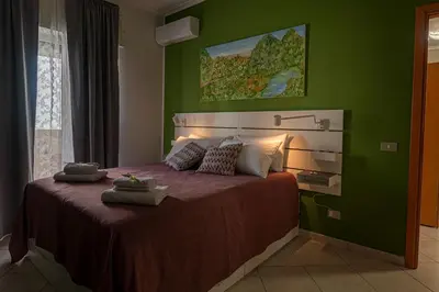 Letto o letti in una camera di Renza House Chiaia