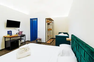 Letto o letti in una camera di Palazzo Belmosto