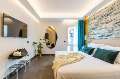 Letto o letti in una camera di Dei Martiri Suite