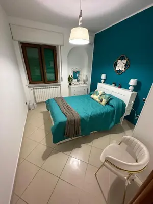 Letto o letti in una camera di Dimora Anema e Core