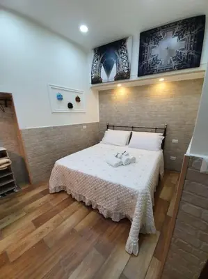 Letto o letti in una camera di Rosy Maison