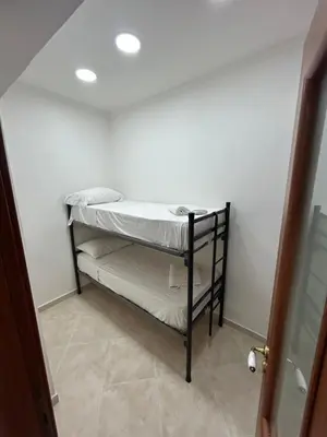 Letto o letti in una camera di DORA HOUSE VALENTINO