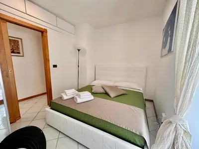 Letto o letti in una camera di Mammina Home Chiatamone