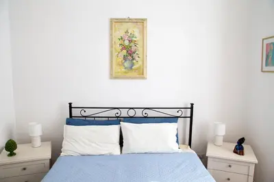 Letto o letti in una camera di Tu Casa: Picturesque Guest House Napoli