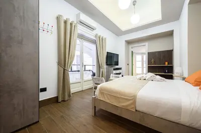 Letto o letti in una camera di Piazza Nicola Amore 14