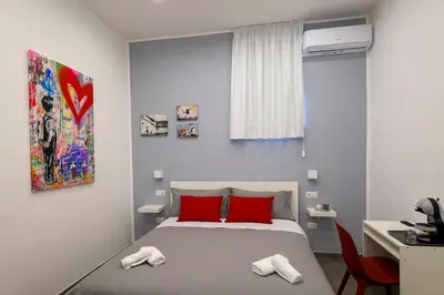 Letto o letti in una camera di Napolitan Pop House
