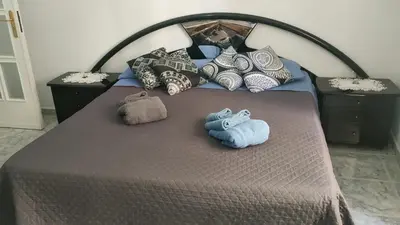 Letto o letti in una camera di GevyNapule