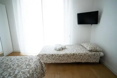 Letto o letti in una camera di La casa di Toto